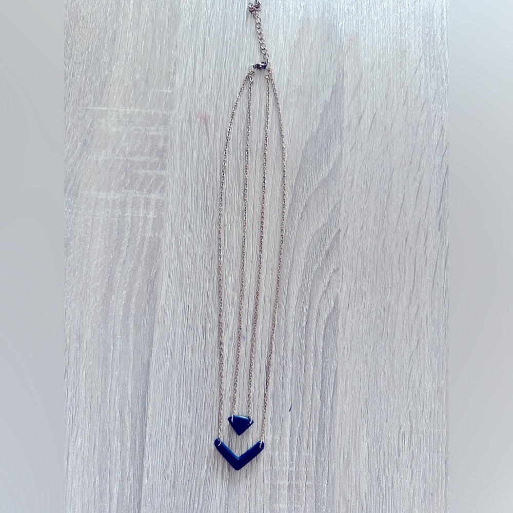 Noonday Collection gold and navy blue Necklace, sits 10”, extends to 11”